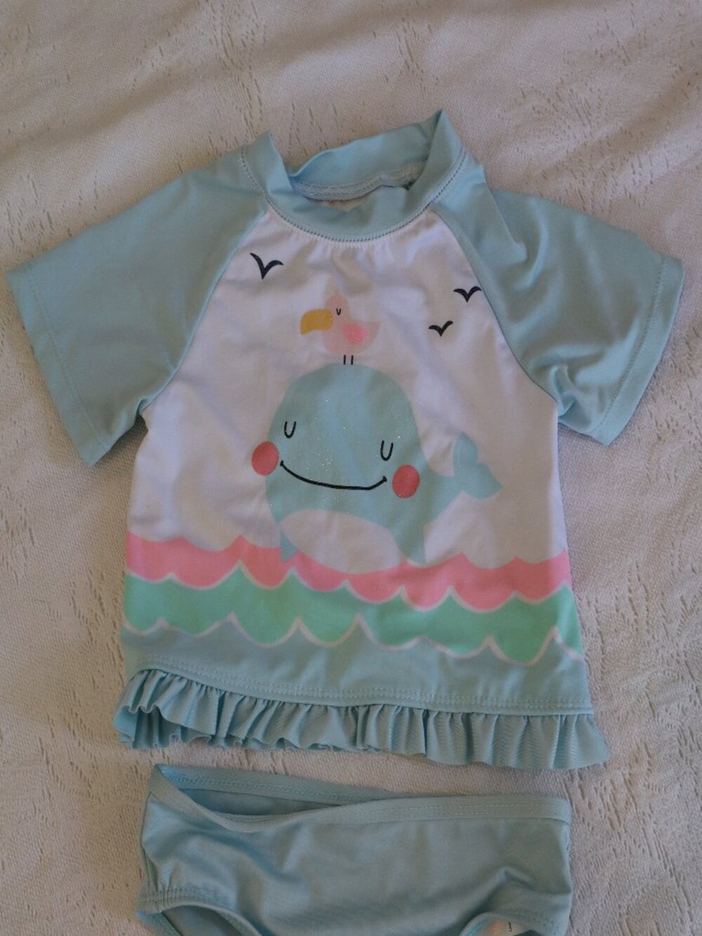 Light Blue Whale Swim top rash guard with matching bottoms. Glittery accents 3T